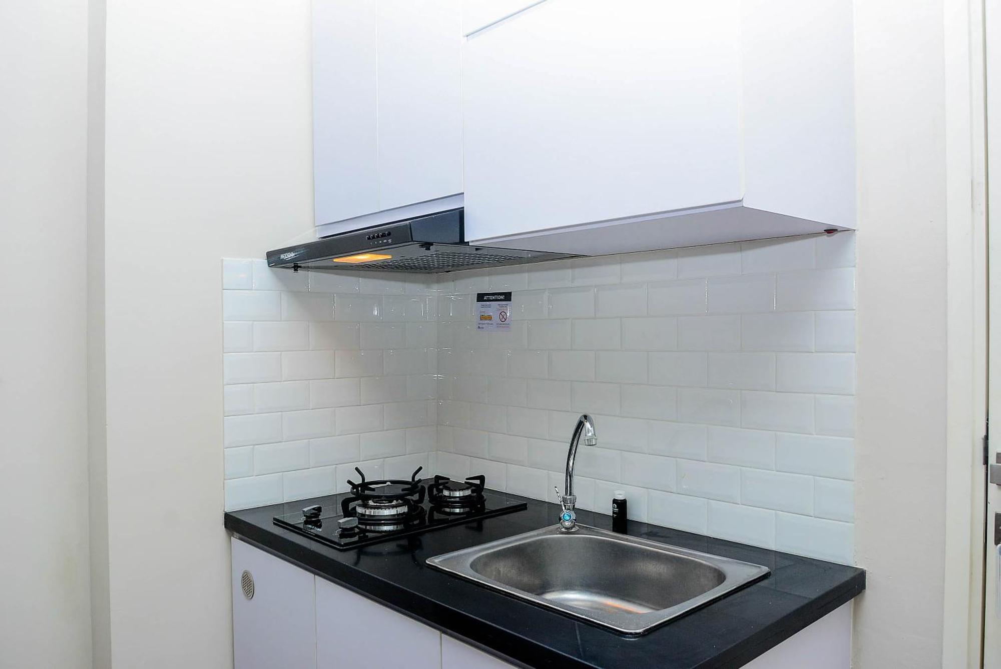 And Relax 2br Springlake Summarecon By Travelio *